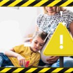 bambino e mamma incinta con segnali di pericolo